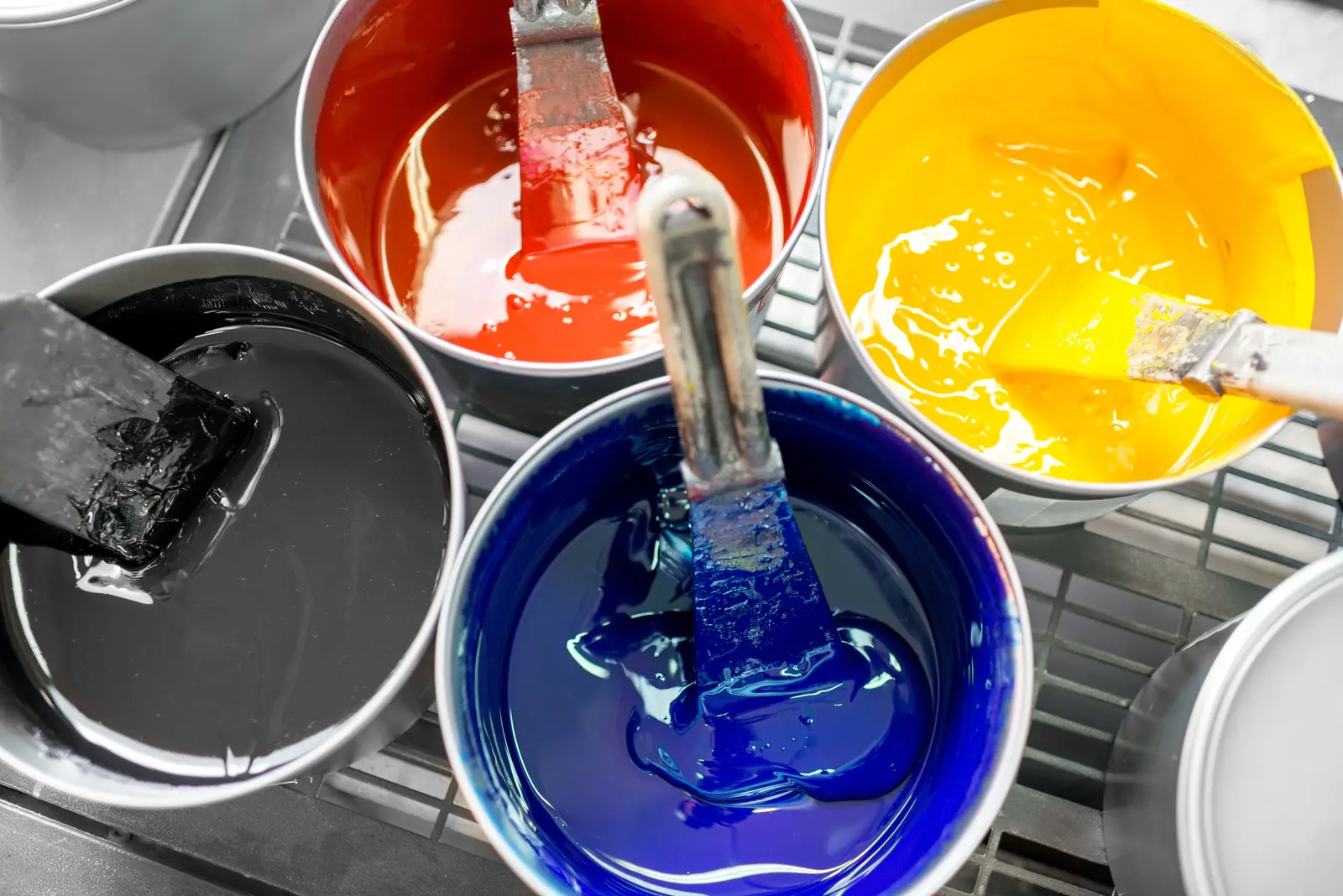 Tins of offset printing ink